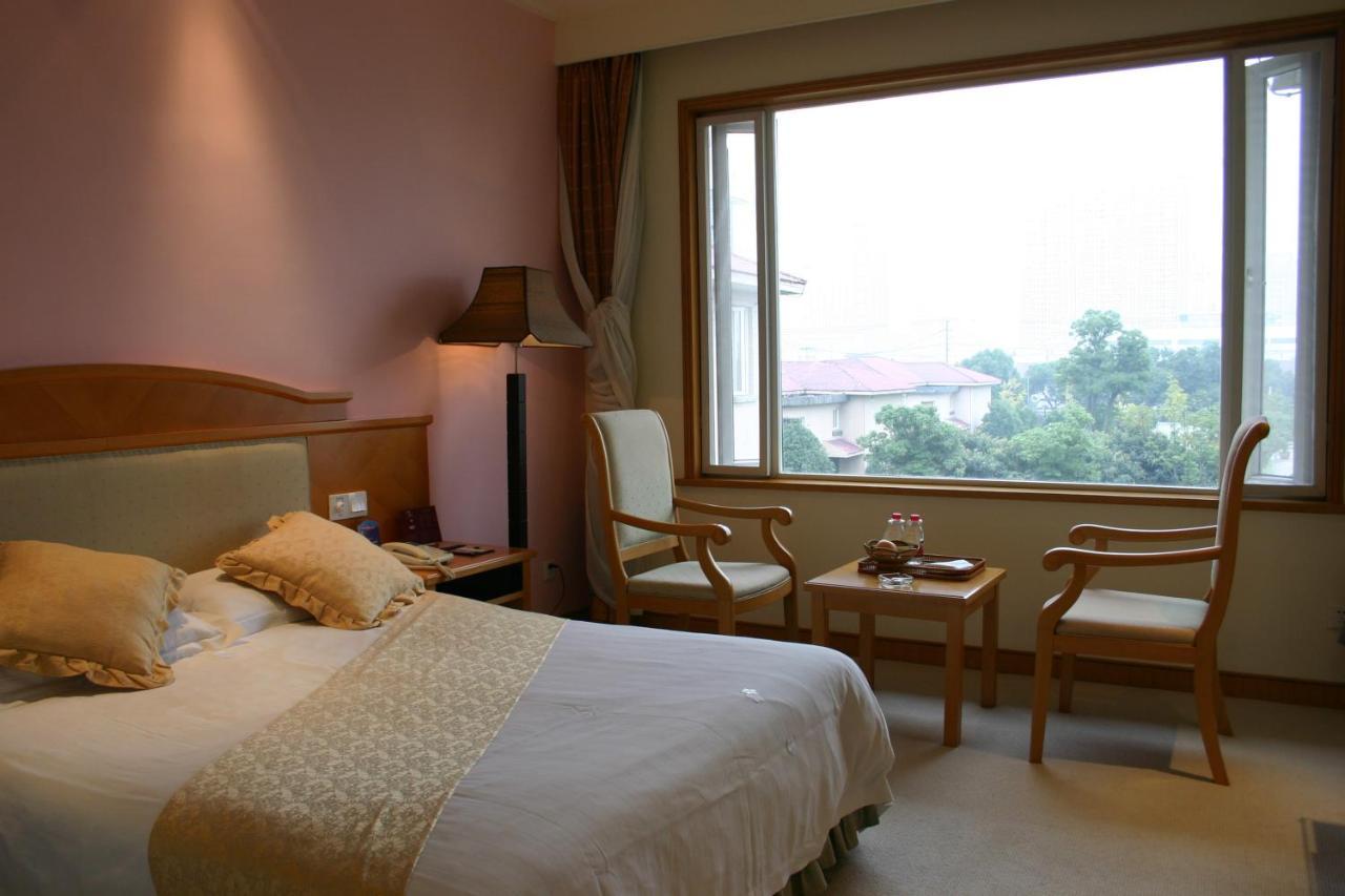 Suzhou Taoyuan International Holiday Hotel Exterior foto